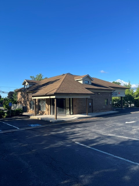 Empty building under clear blue sky